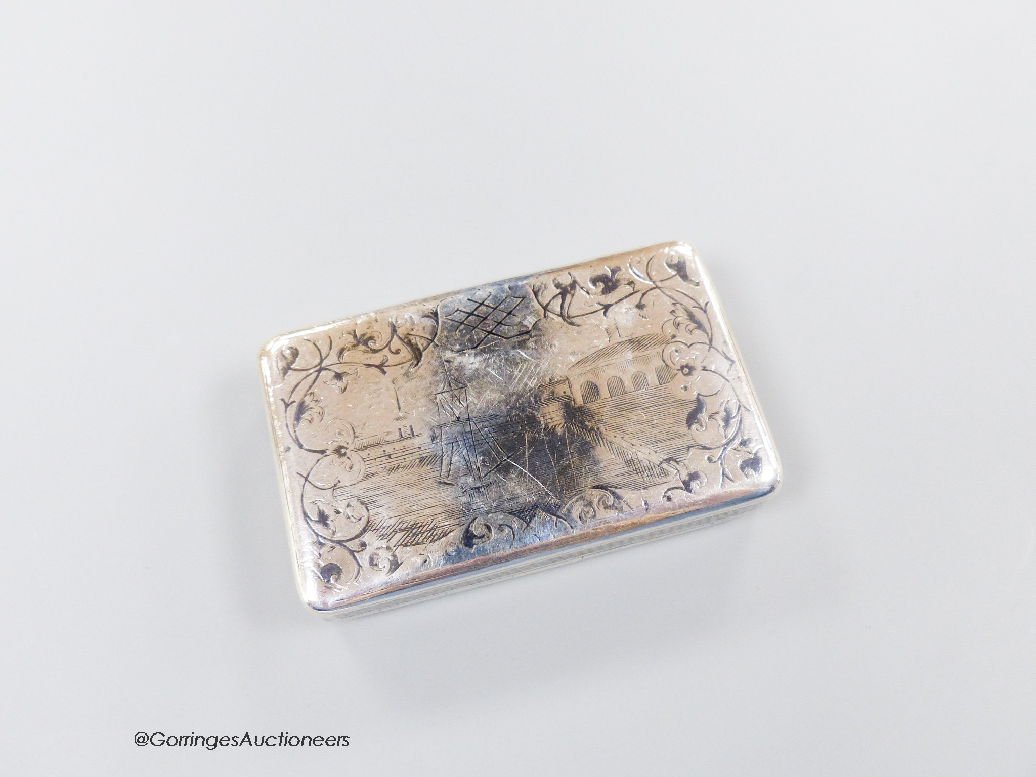 A late 19th century Russian 84 zolotnik and niello rectangular snuff box, with later interior inscription, 85mm, 99 grams (tired).